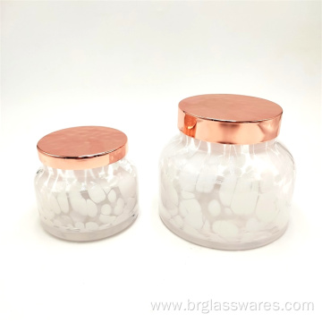 Swirled spots glass candle holder with metal lid